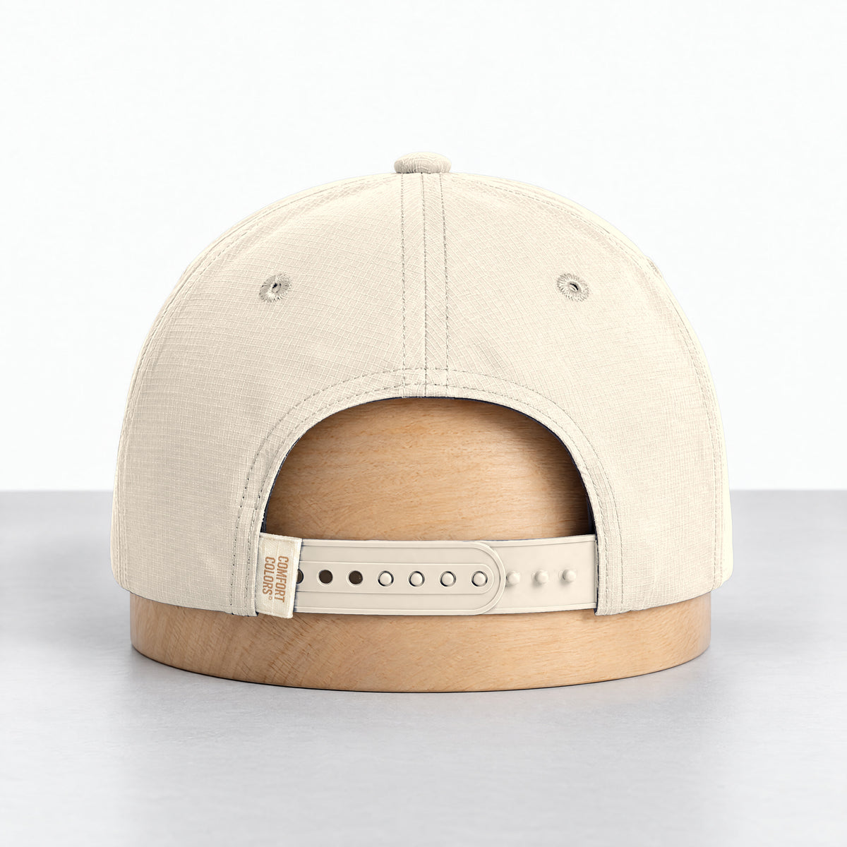 Ivory rope hat, back view with the adjustable snapback and Comfort Colors label