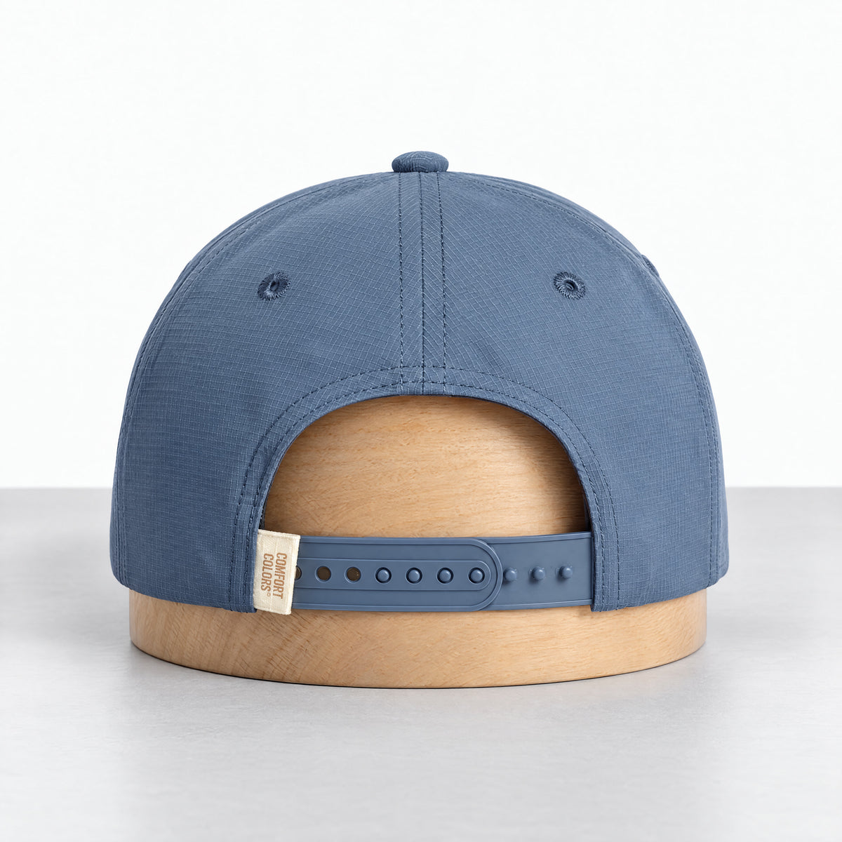 Blue Jean rope hat, back view with the adjustable snapback and Comfort Colors label