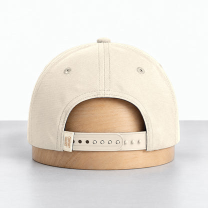 Ivory rope hat, back view with the adjustable snapback and Comfort Colors label