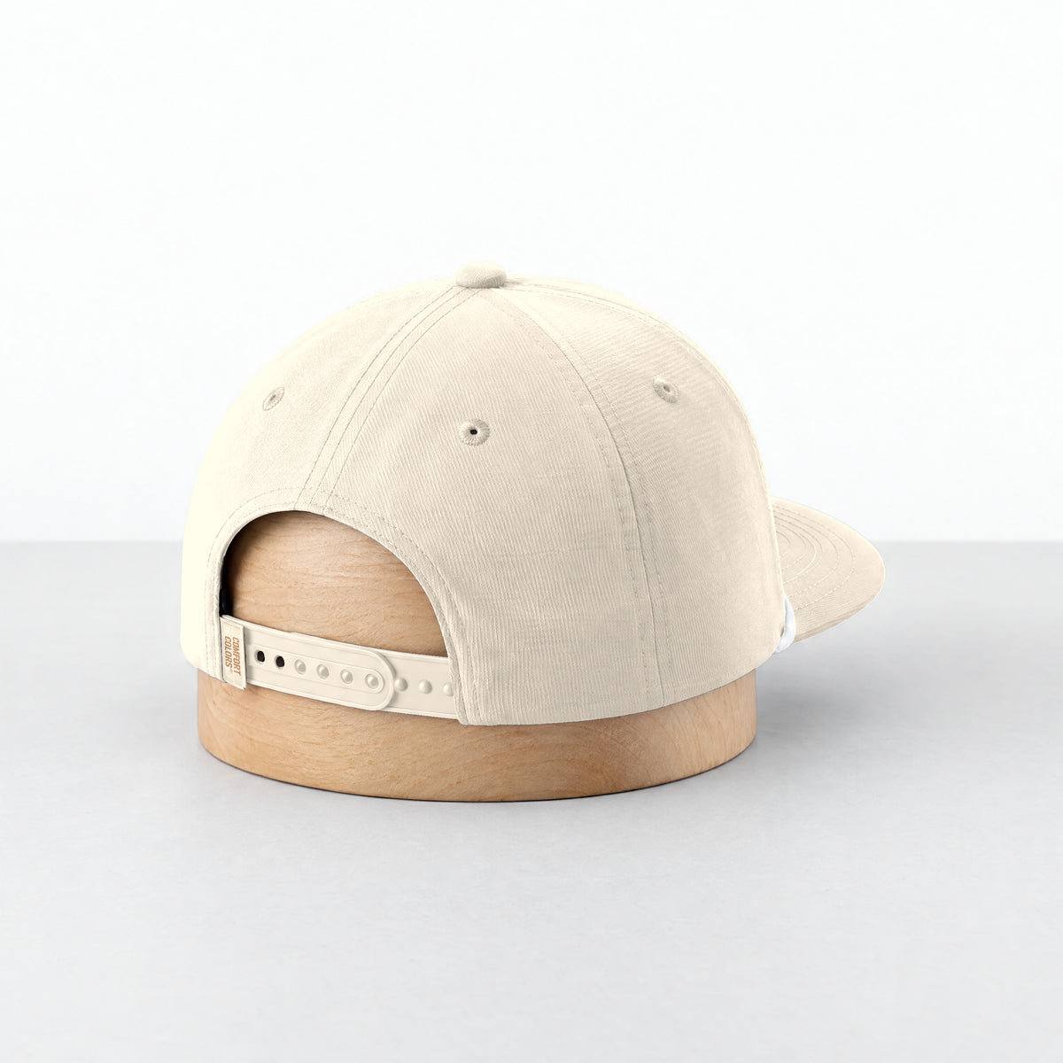 Ivory rope hat, three-quarter back view with the adjustable snapback